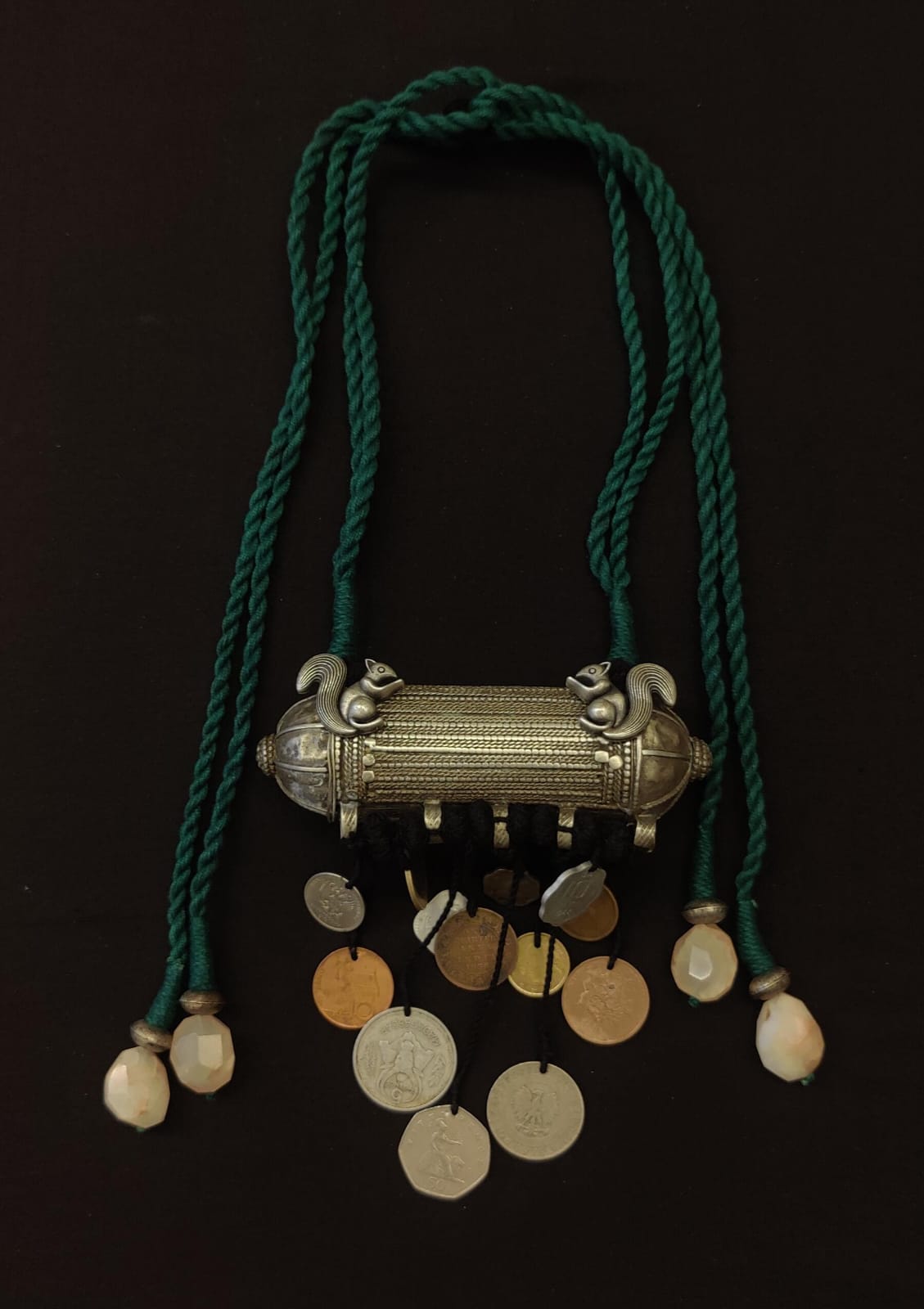 Tribal pendant with coin tassels