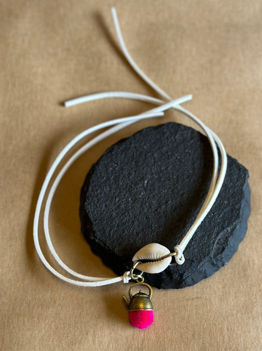 Cowrie rakhi