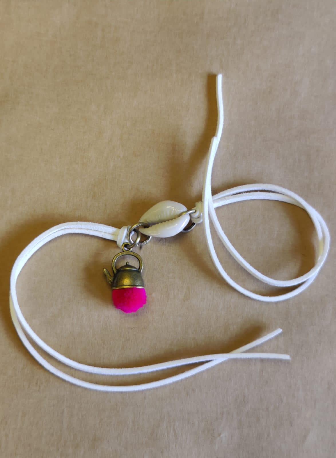 Cowrie rakhi