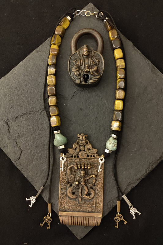 Antique brass comb necklace