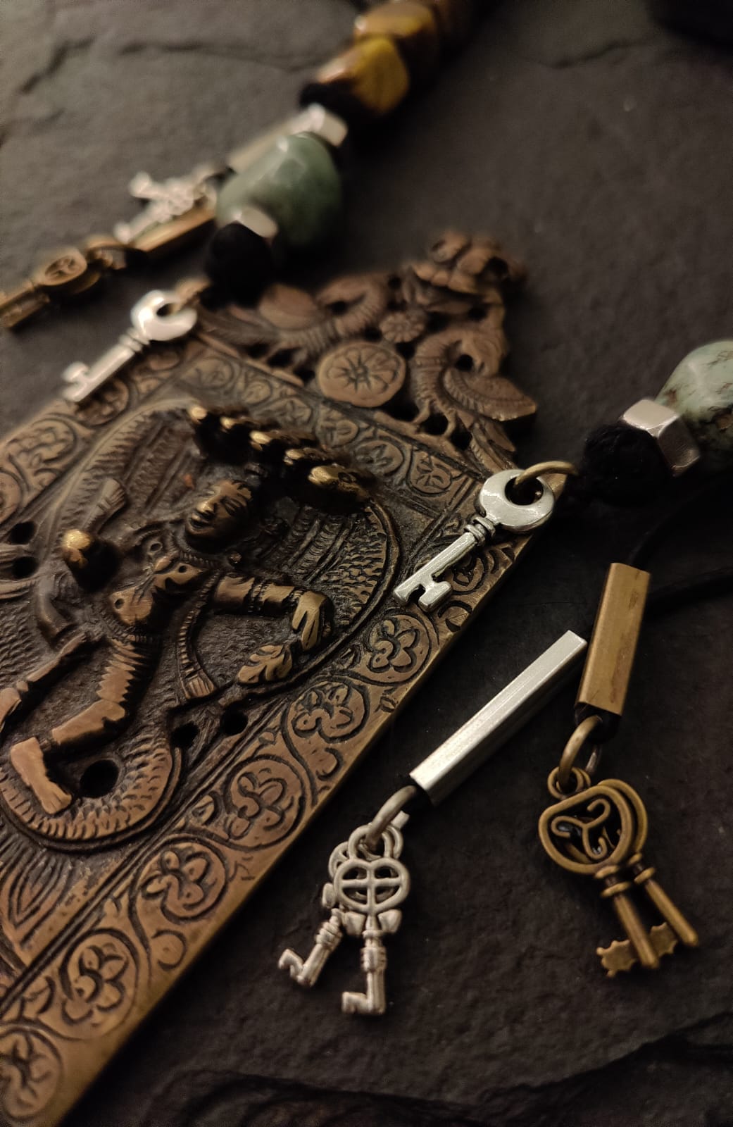 Antique brass comb necklace