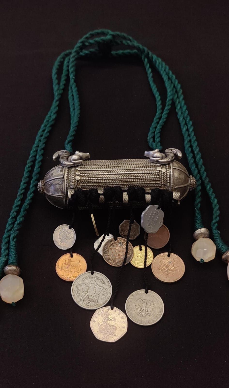 Tribal pendant with coin tassels