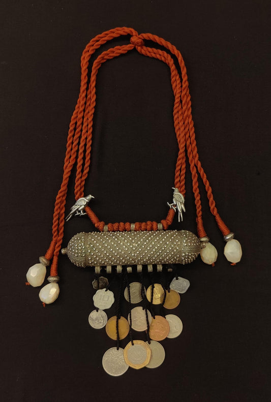 Tribal pendant with coin tassels