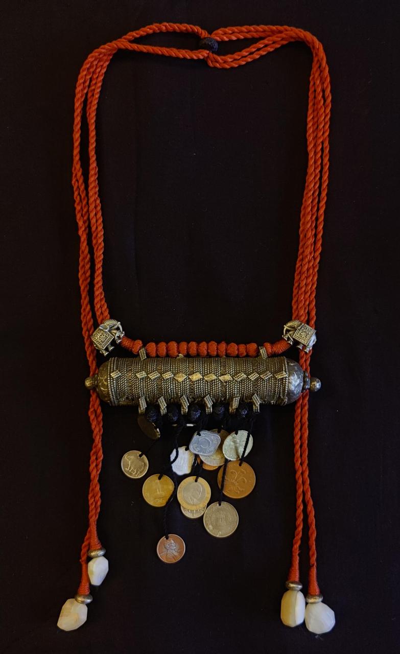 Tribal pendant with coin tassels