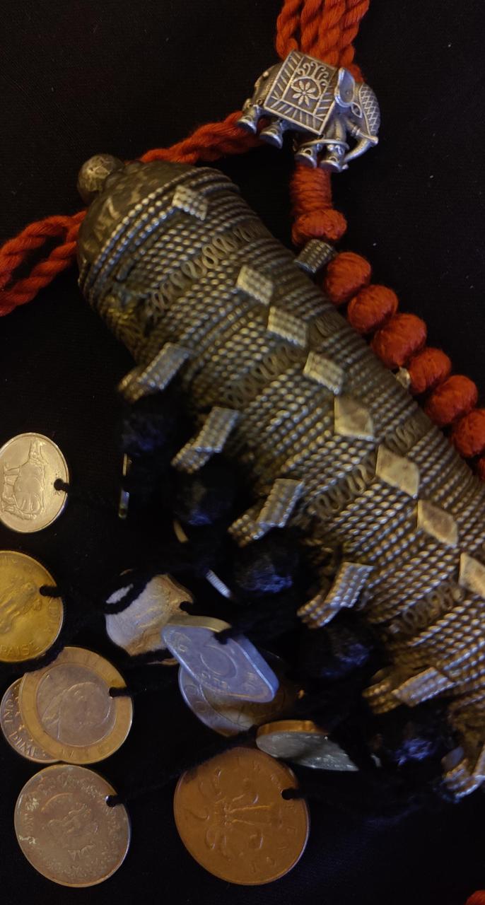 Tribal pendant with coin tassels