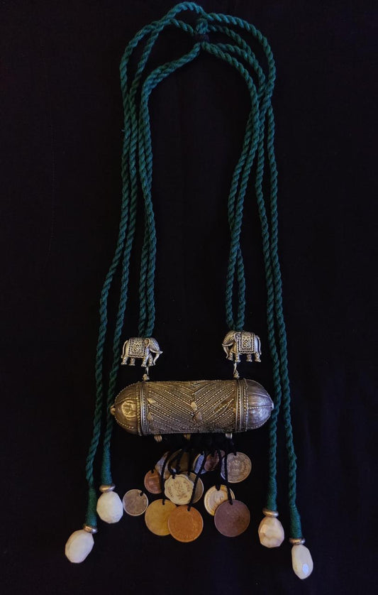 Tribal pendant with coin tassels