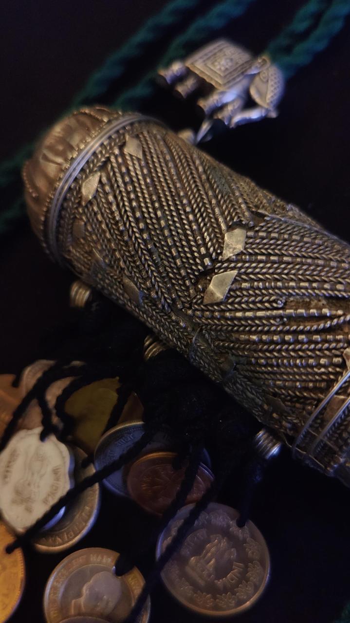 Tribal pendant with coin tassels