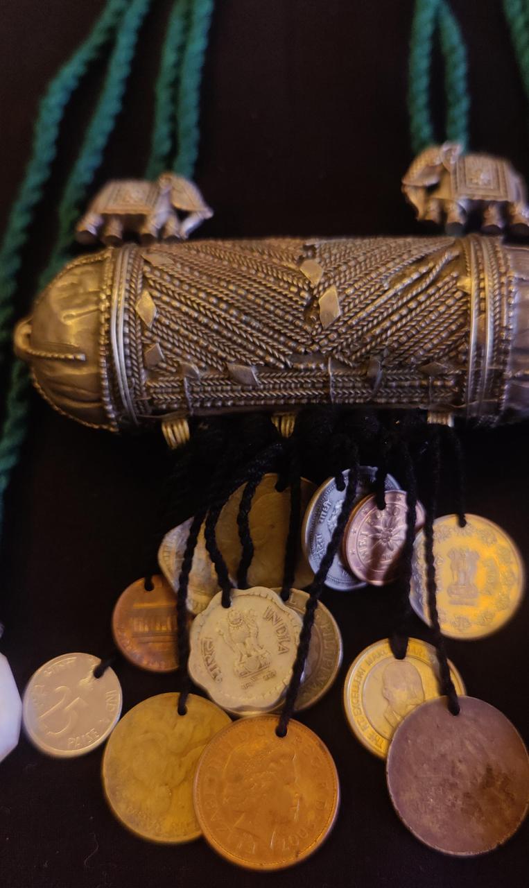 Tribal pendant with coin tassels